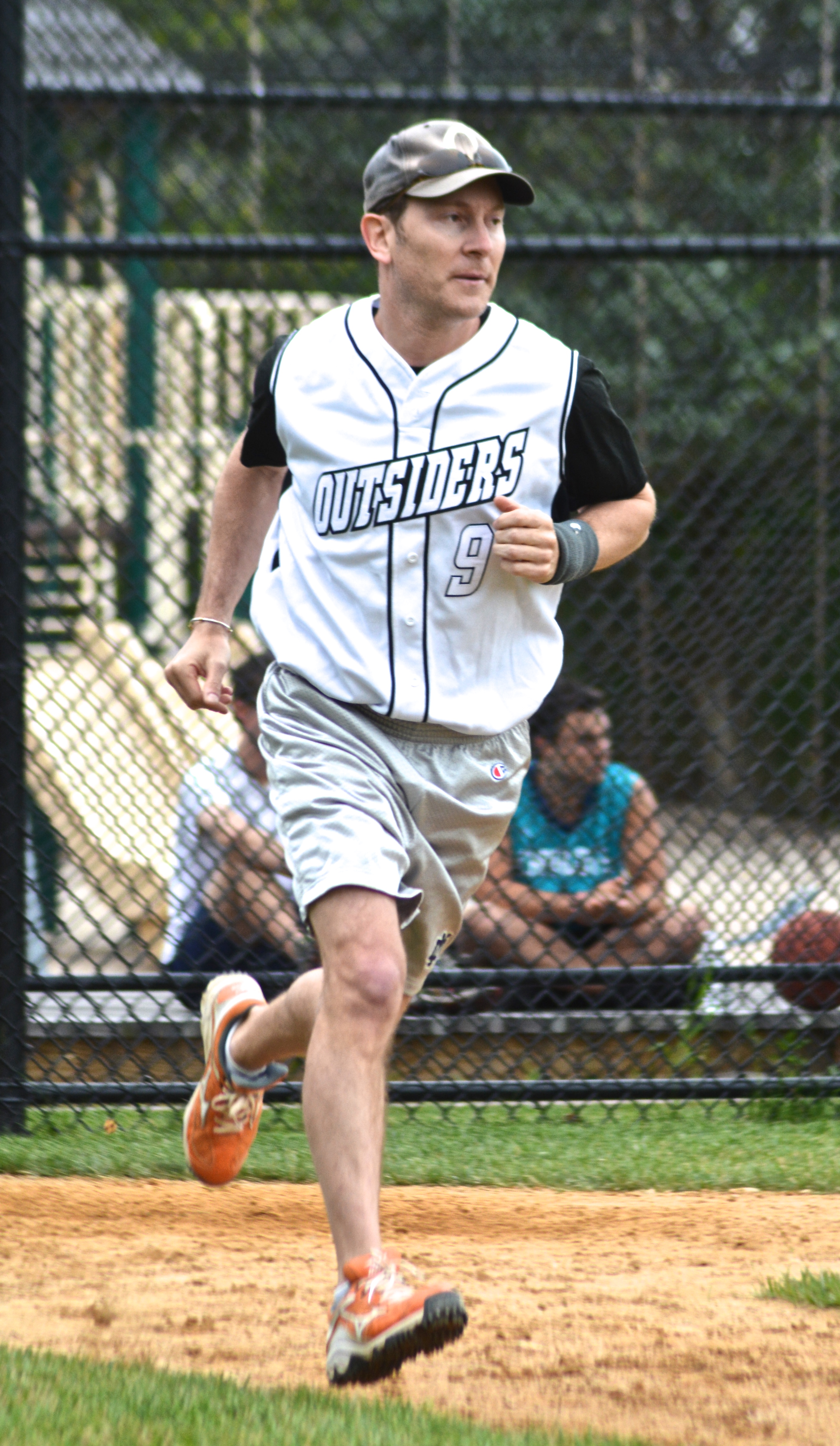Peter Taub on his way to first base.