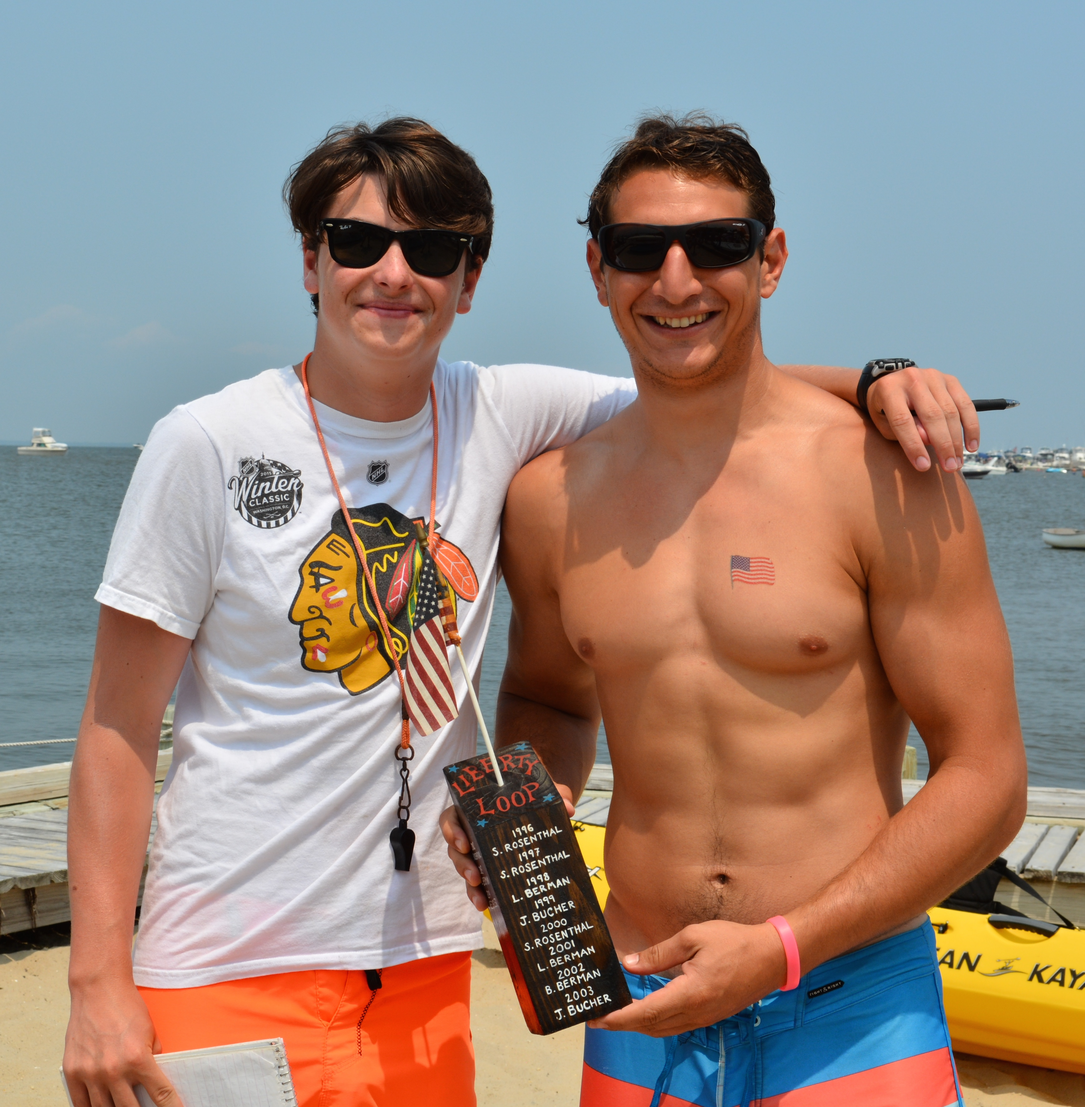Sam Bither commodore of the 2015 Liberty Loop presents Mike Perna with Trophy